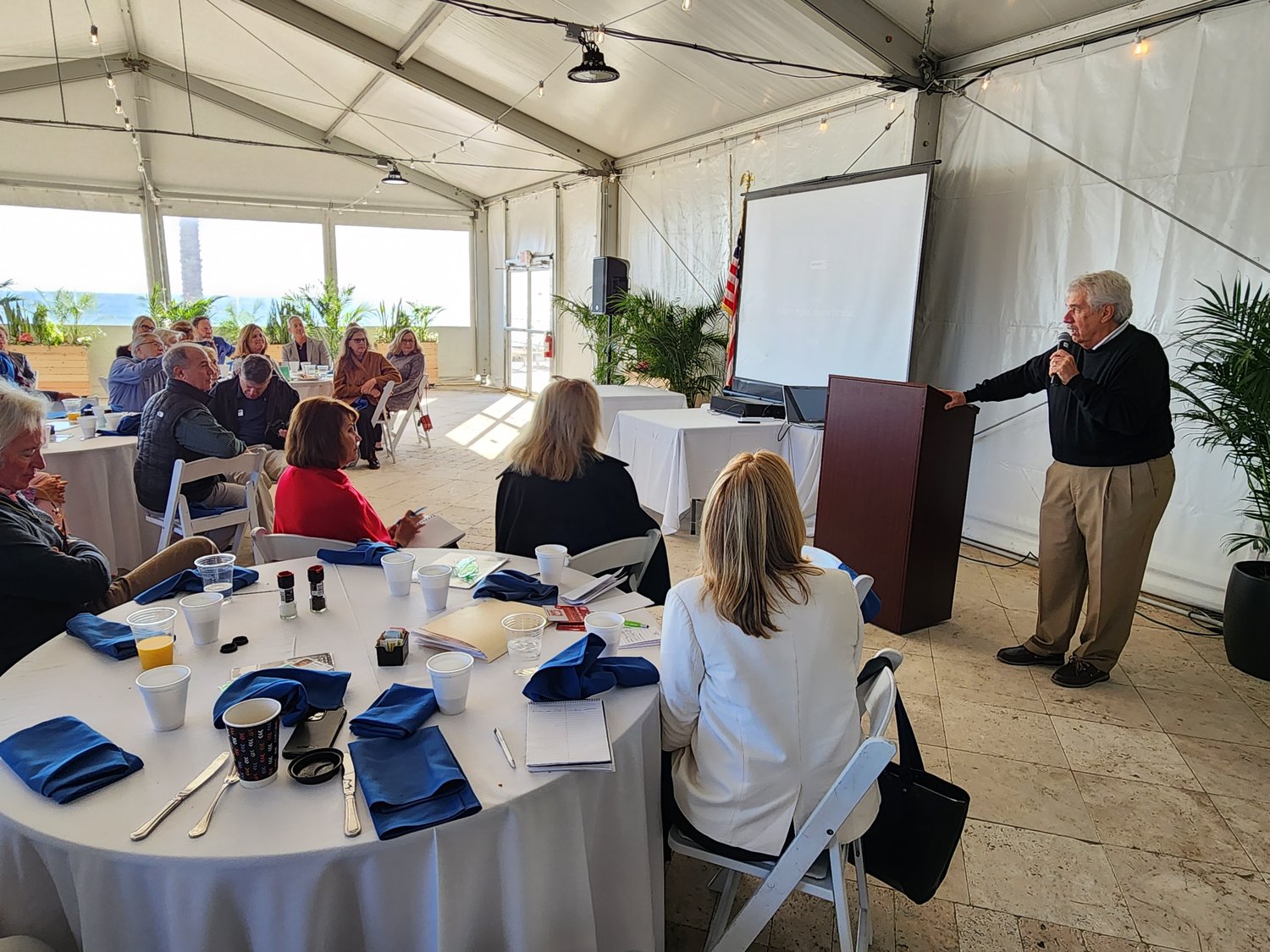 Local realtor Jake Piatt spoke about his experience as a pilot during the Vietnam War as guest speaker at the NEFAR quarterly breakfast at The Plantation Beach House March 14.